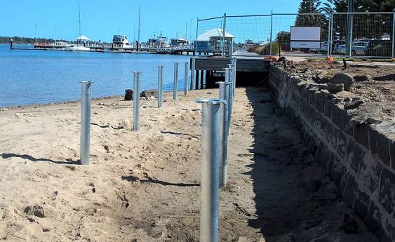 Seawall piles near completion